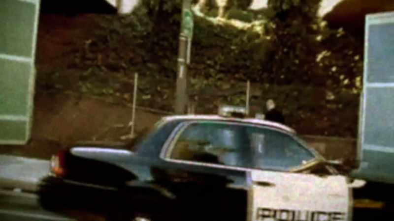 ( police radio chatter )
