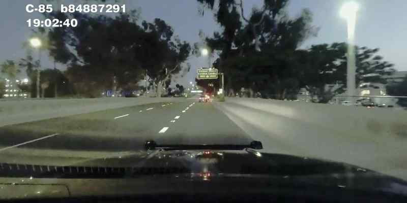 [police radio chatter]