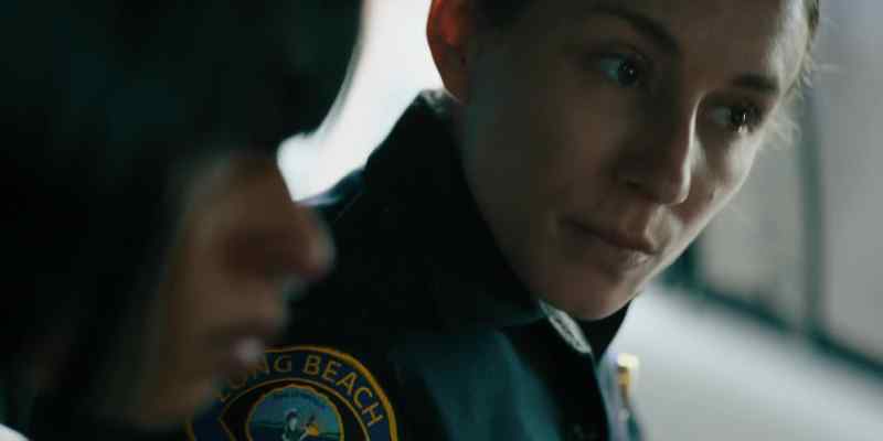 [police radio chatter]