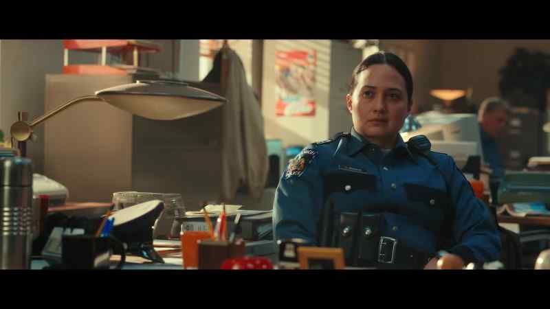 [police radio chatter]