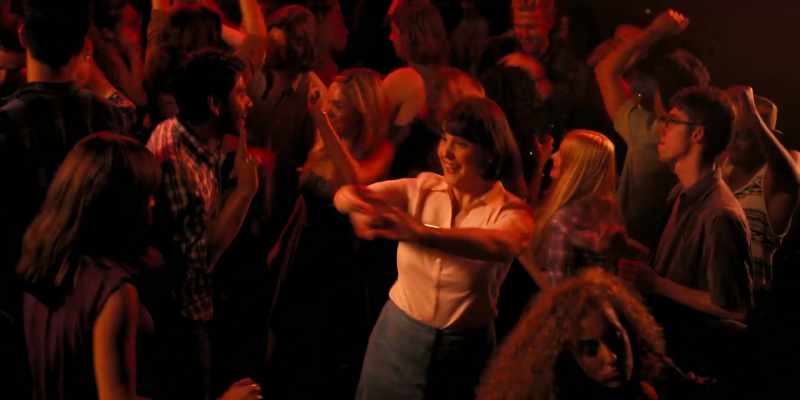 [pop music playing]