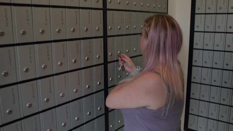 (post office chatter) -(phones ringing)