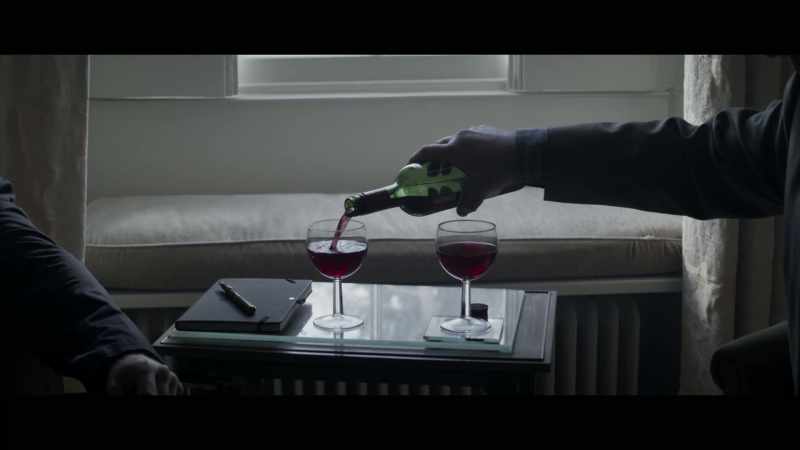 [pouring wine]