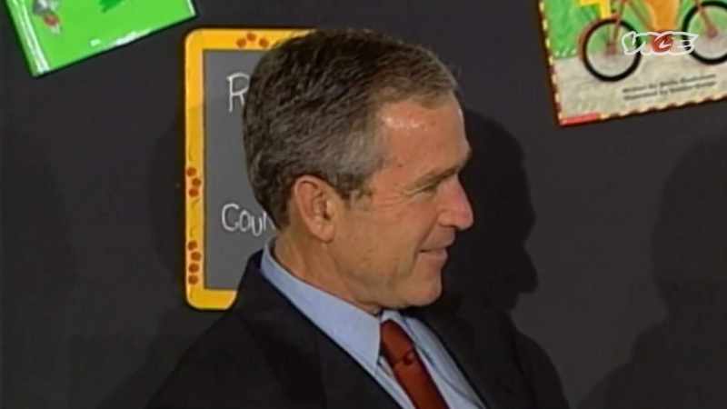 President George W. Bush is visiting an elementary school