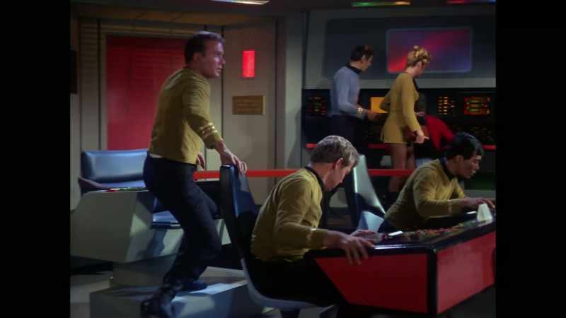 Press this button. Do this. Warp three. Get us out of here,