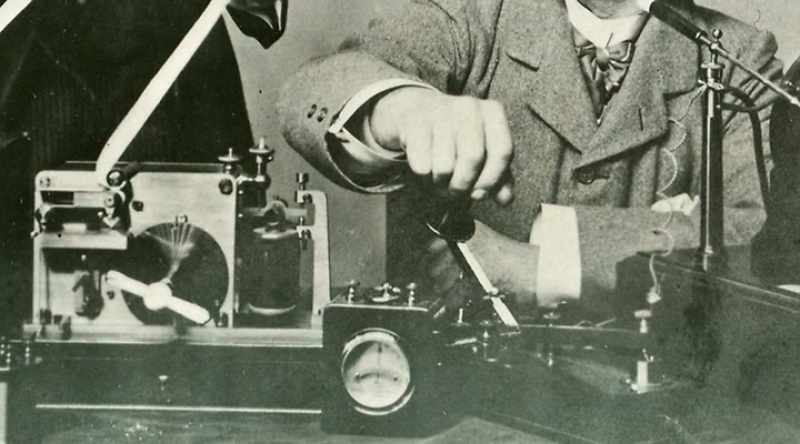 Pressing a small button on the side of the hand