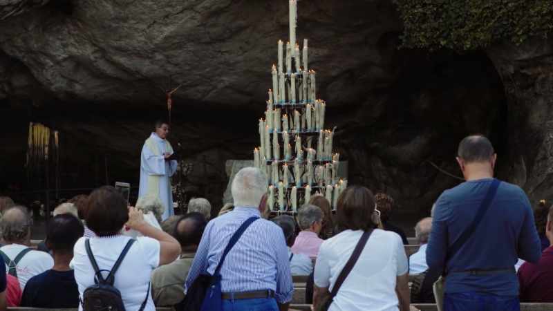 [priest preaching in Italian]