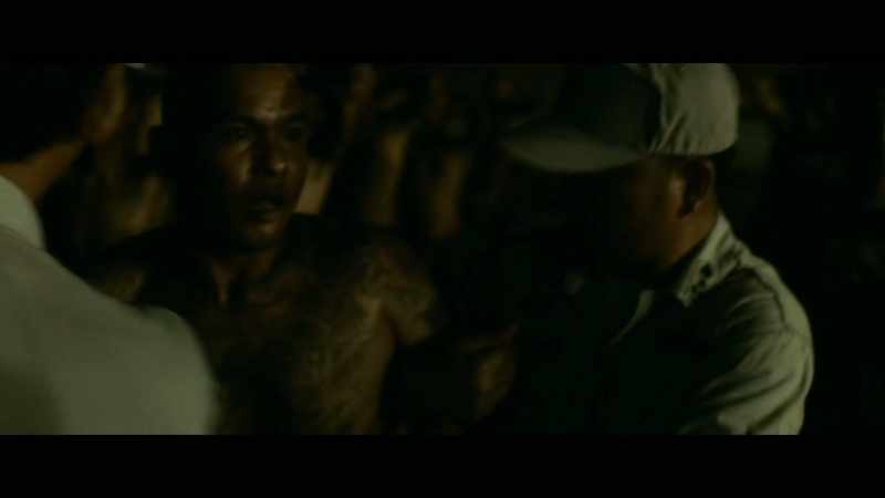 PRISON OFFICER WHISPERS TO GUARD