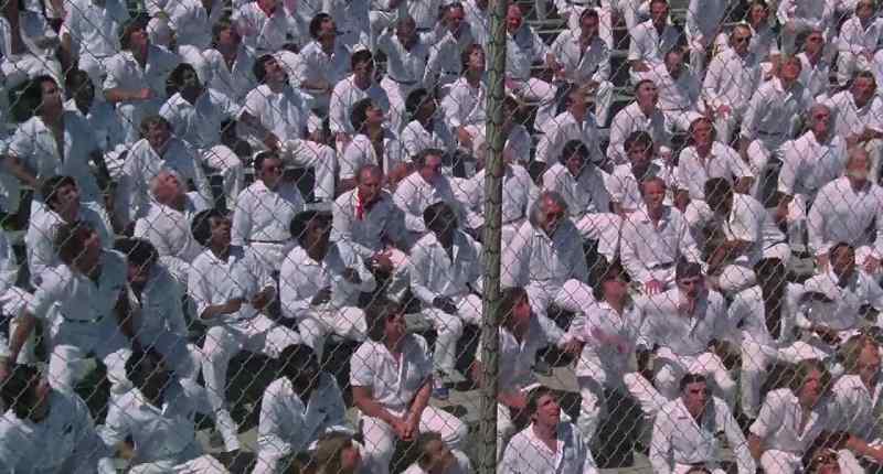 [PRISONERS YELLING]