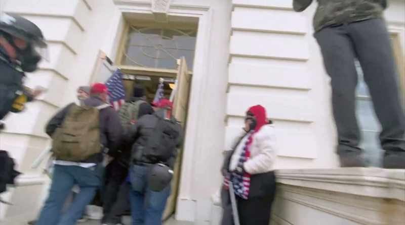 Protester (shouts): Woo! Woo-hoo! Woo!