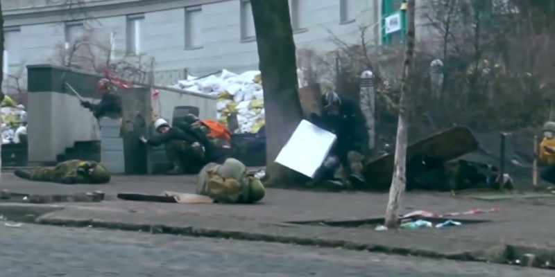 Protesters confronting security services