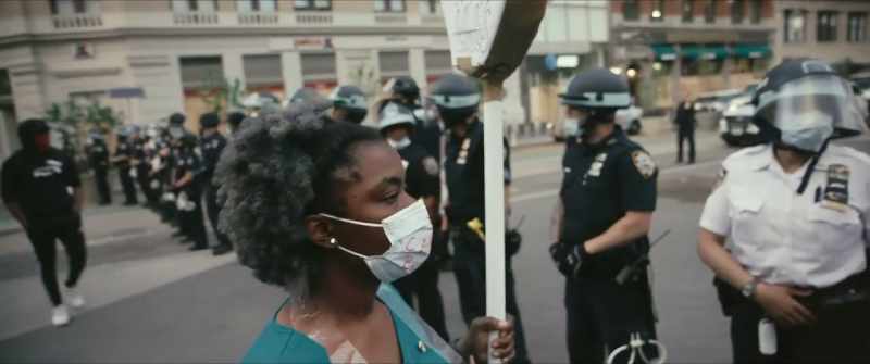 PROTESTOR: Black Lives Matter. Black Lives Matter