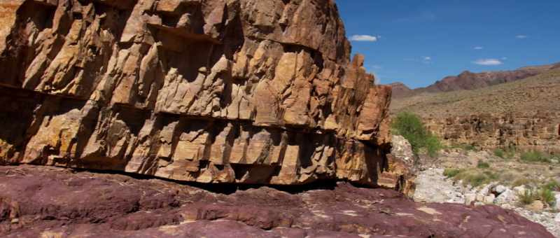 and pulverizing rock, depositing a thick layer