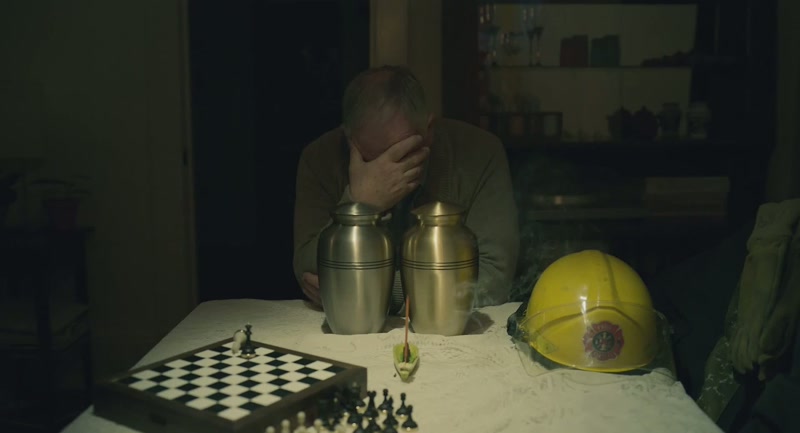 [quiet, somber instrumental playing]