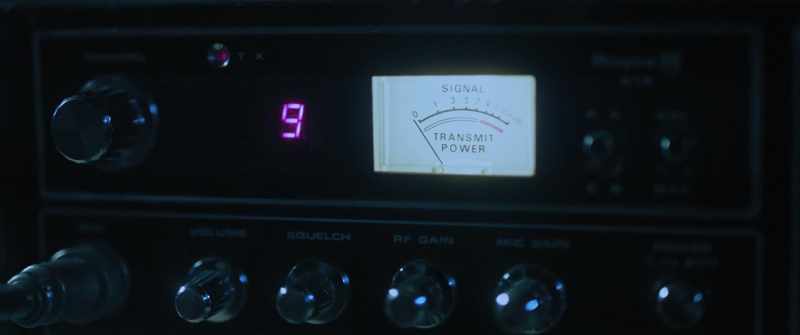 [radio static hissing] [soft tense music]