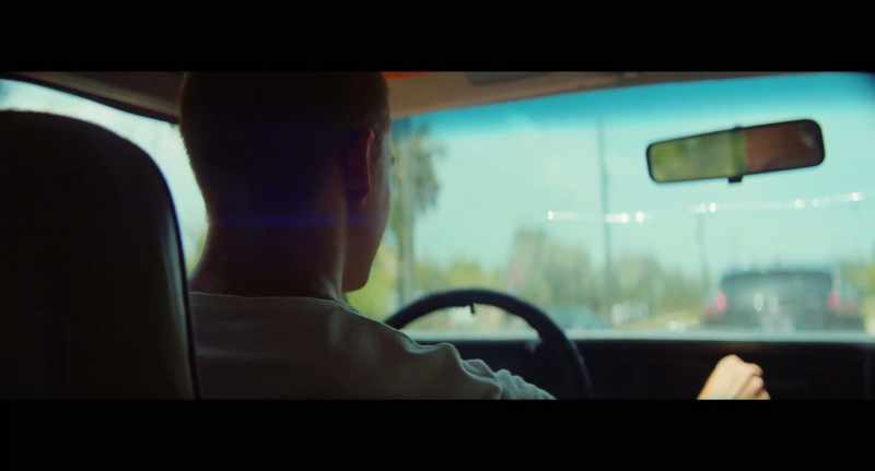 (R&B MUSIC PLAYING ON CAR STEREO)