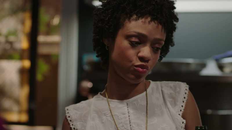 [R&B music playing on radio]