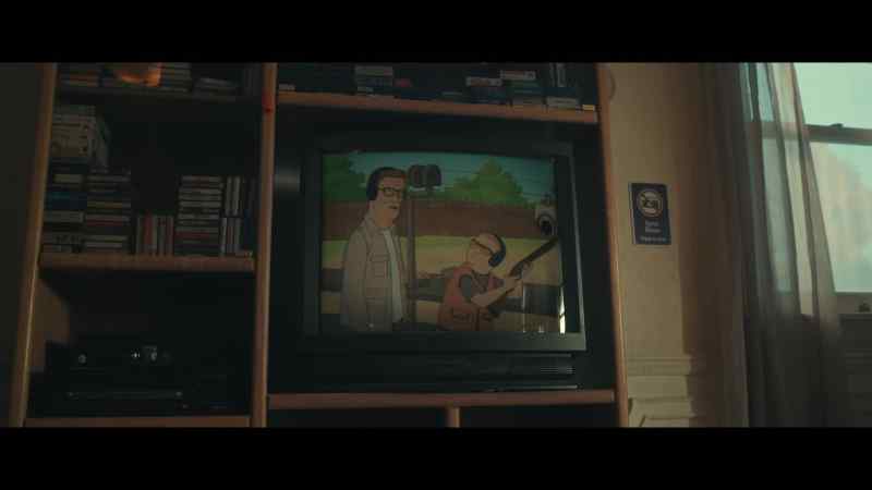 [rapid gunshots on TV]