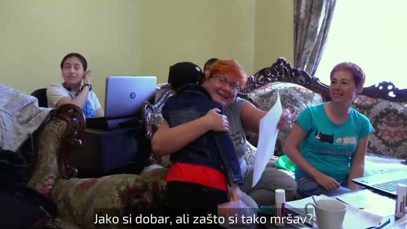(red-haired woman speaking)