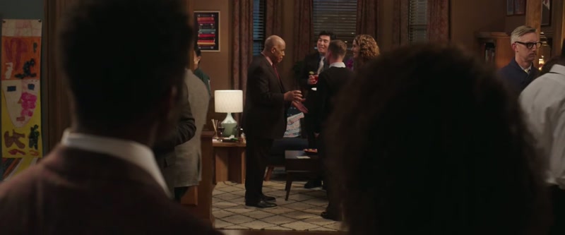 Regaling the white folks with his wit and charm