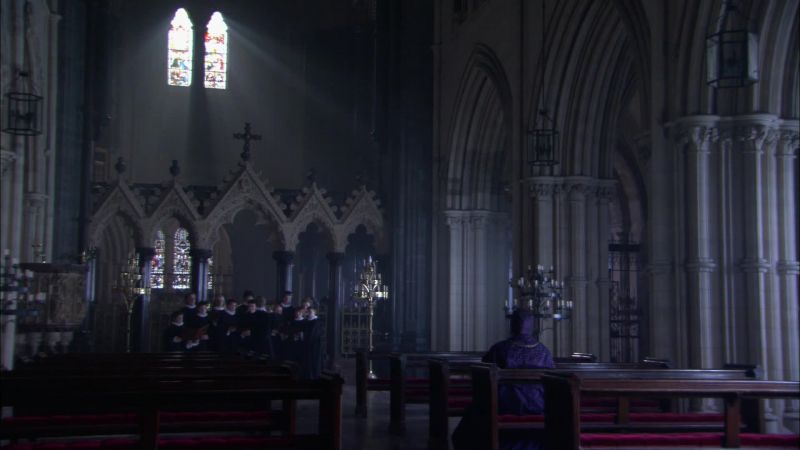 [Religious music, choir singing]