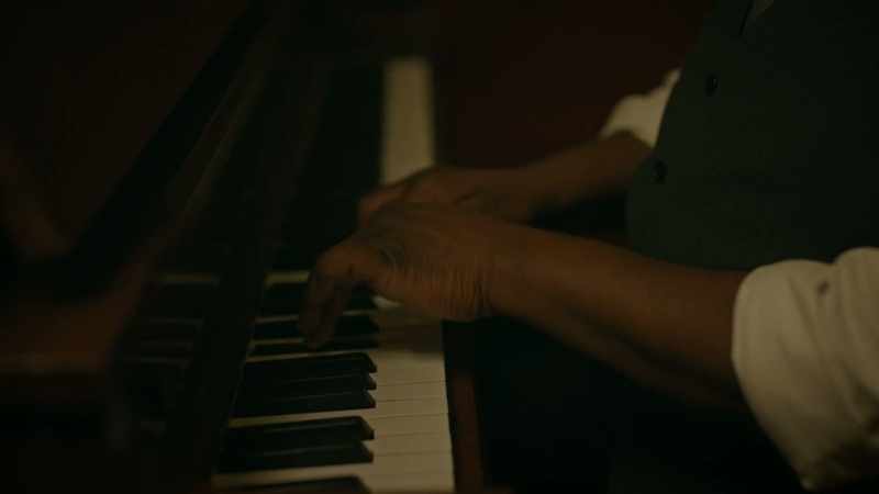 (rhythmic piano music)