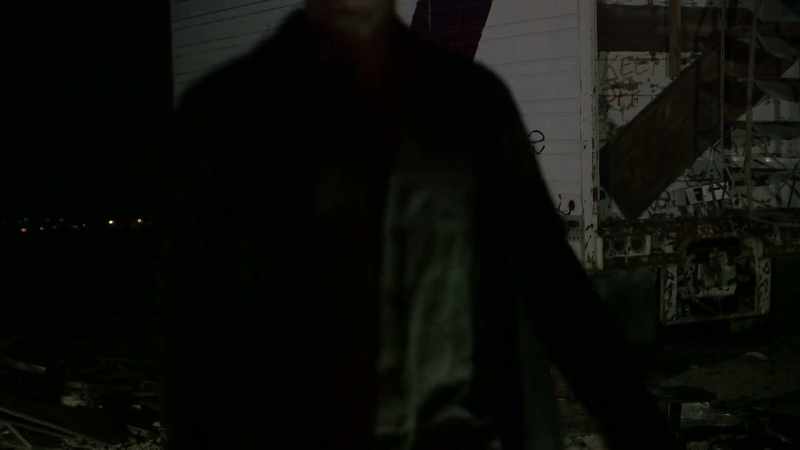 [rhythmic and tense electronic music]