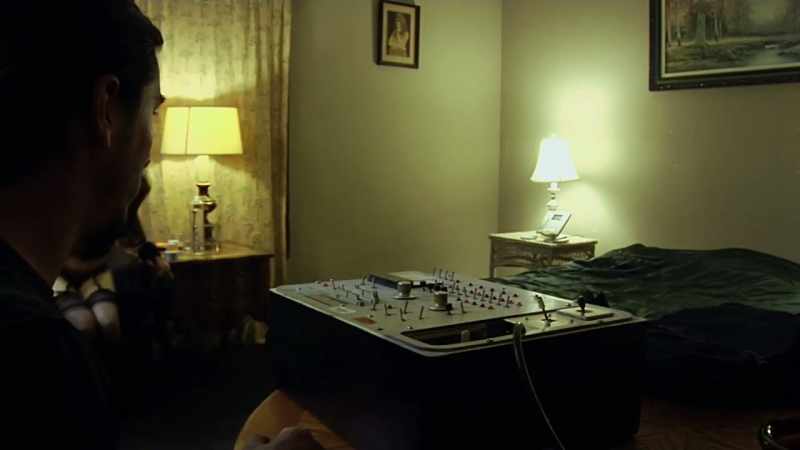 [rhythmic, vaguely ominous and eerie electronic music]