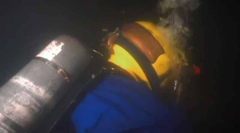 Rick Simon and his father Eric dive into the pipe to fix the problem