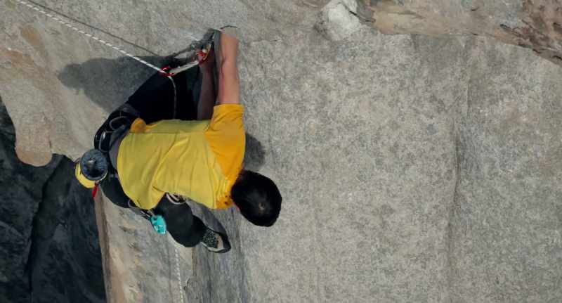 Right foot sinks low to a flat edge, left foot steps through to an edge