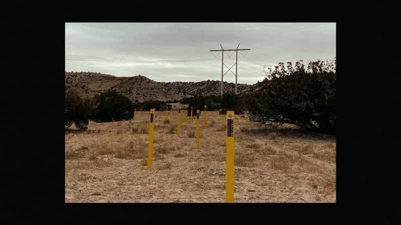 Right here, underground pipe