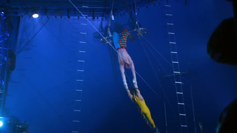 RINGMASTER: Ladies and gentlemen, The Flying Graysons!