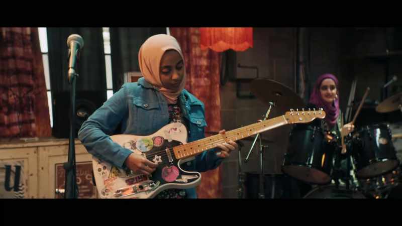 [rock music playing]