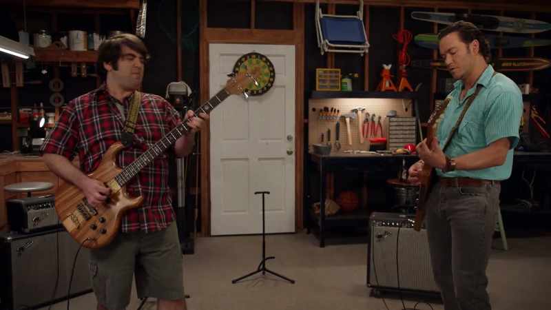 [ Rock music playing ]
