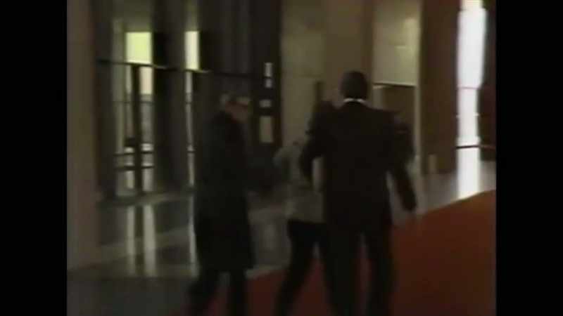 Rossi was accompanied into court