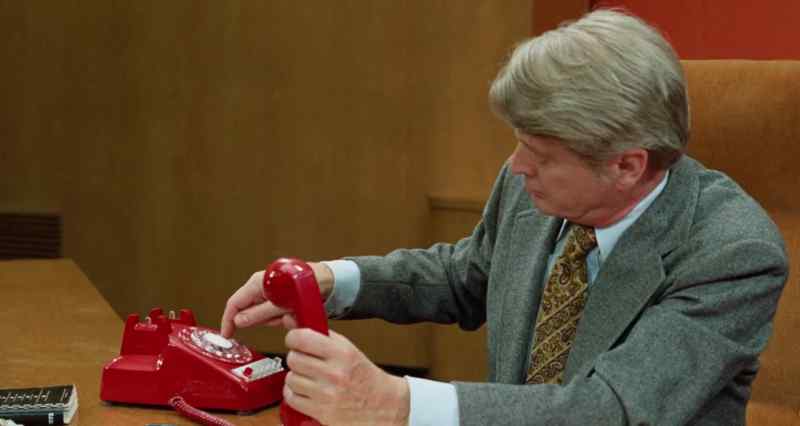 (rotary phone clicking)