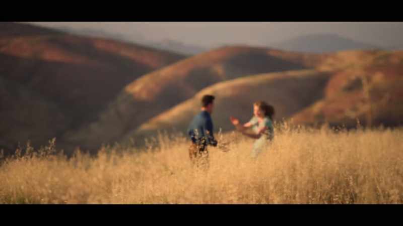 Run through a moonlit field, laughing
