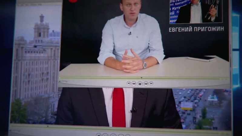 (RUSSIAN NEWSCASTERS OVERLAPPING)