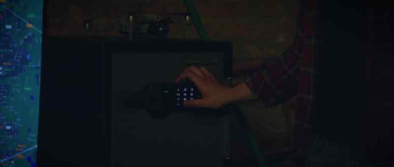 (safe beeping and whirring)