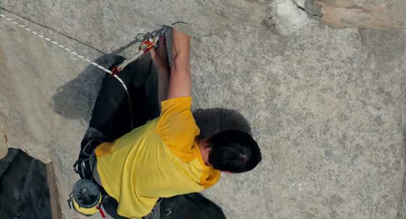 Sag down onto it, right hand crosses under to an under cling, side pull