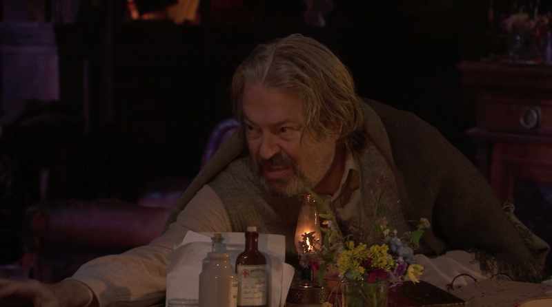 Scowling back at me from his deathbed