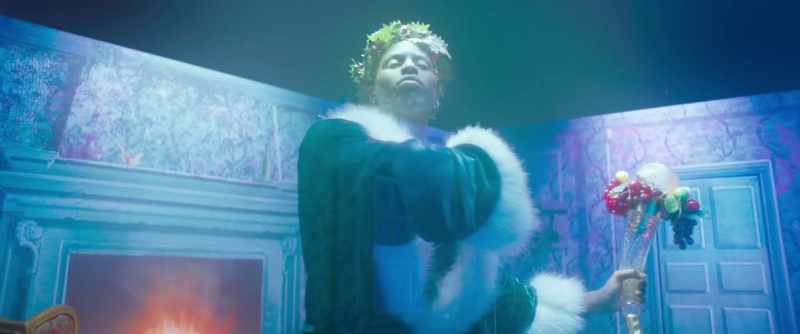 Scrooge reverently did so