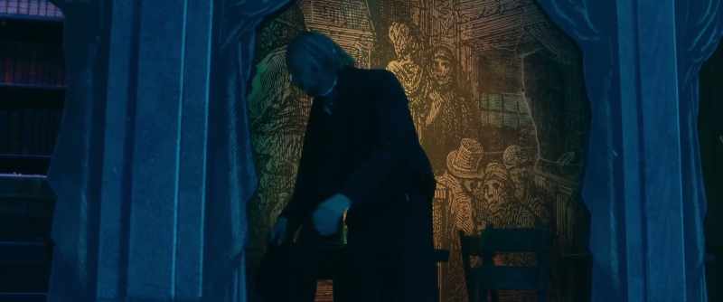 Scrooge took his melancholy dinner