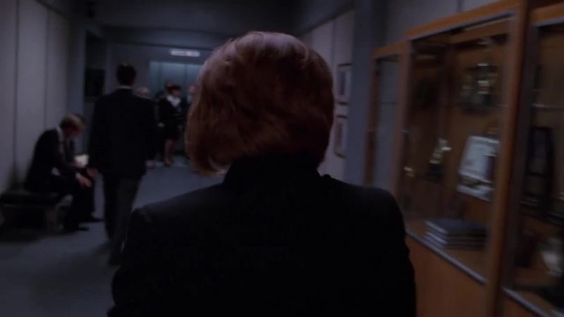 Scully going to the cellphone