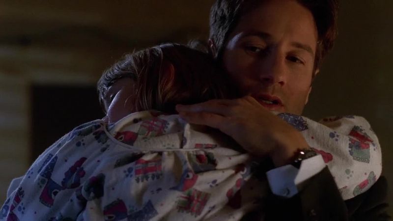 Scully? There's something on her neck