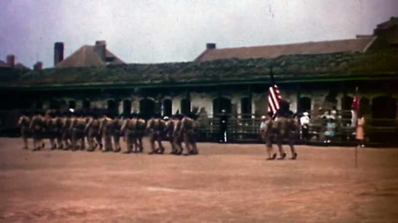 Sergeant Robert Smith marches into captivity
