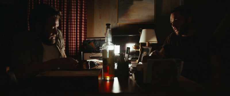 [setting down bottle]