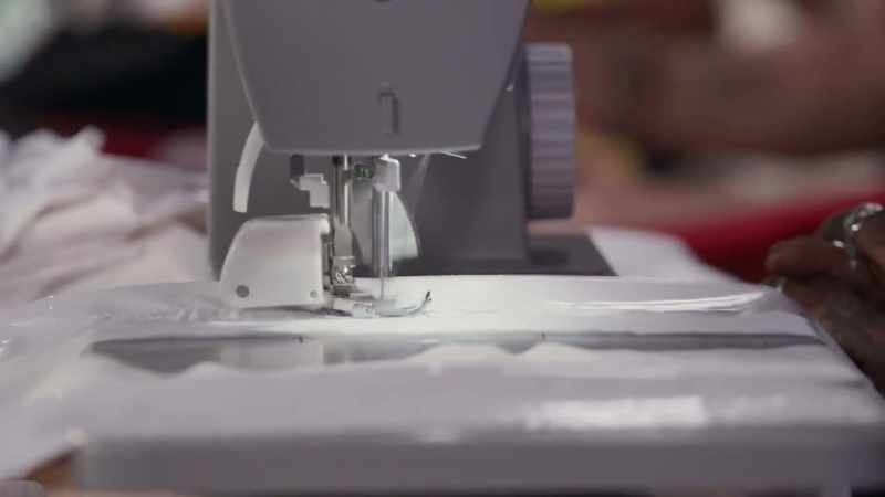 [sewing machine hums]