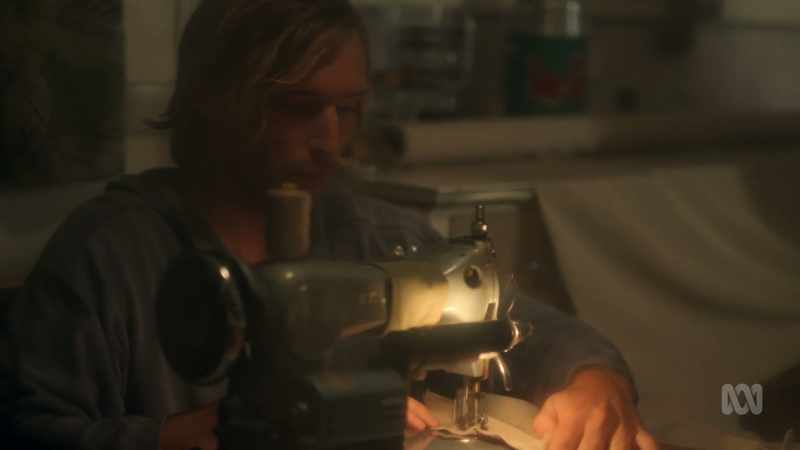 (SEWING MACHINE WHIRRS)