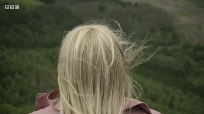 SHE BREATHES DEEPLY